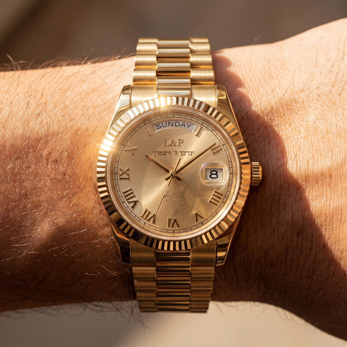L&P Shalom - Priestly Blessing gold watch on wrist